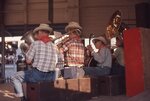Band Performs on Covered Stage by Richard Hoffman