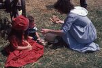 Children Eat Cookies on Festival Grounds by Richard Hoffman