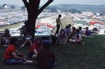 Visitors Resting on Festival Grounds by Richard Hoffman
