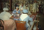 Women Hand-Stitch Quilts in Quilt Barn by Richard Hoffman