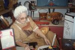 Woman Paints Ceramic Dish in Art Vendor's Booth by Richard Hoffman