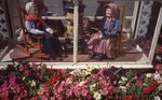 Dolls in Living Room Display by Richard Hoffman