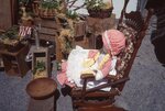 Display with Doll on Festival Grounds by Richard Hoffman