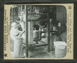 Filling and Sewing Bags of Granulated Sugar, New York City. by Keystone View Company