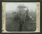 Digging Ditch with Tractor and Laying Drain Tile, Wis. by Keystone View Company