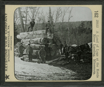 A Load of Logs at the Kettle River Landing, Minnesota. by Keystone View Company