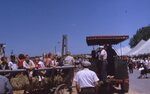 "Folk Festival: Threshing Machine Pulls Hay Wagon" by Lillian Walters and William Walters